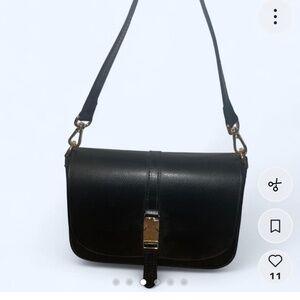 Black purse with gold accents from Italy